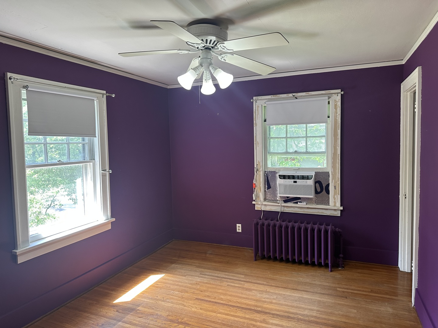 1418 North Sheridan Road Peoria, IL 61606 - Photo 27 of 34 a view of an empty room with wooden floor and a window