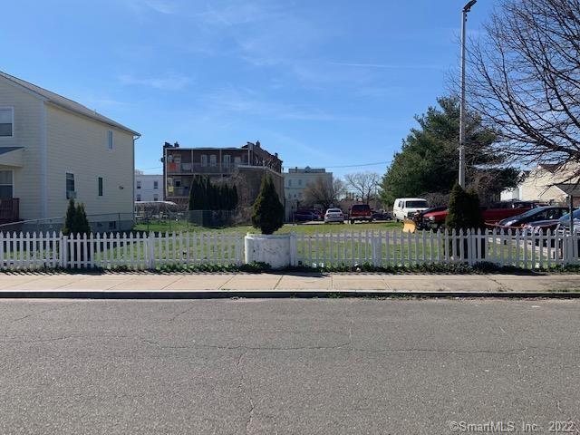 a view of a street in front of a building