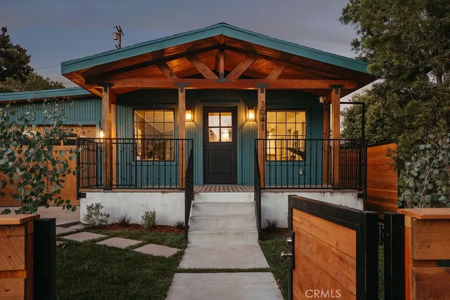 a front view of a house with a porch