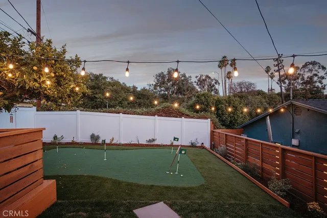 a backyard of a house with lots of green space