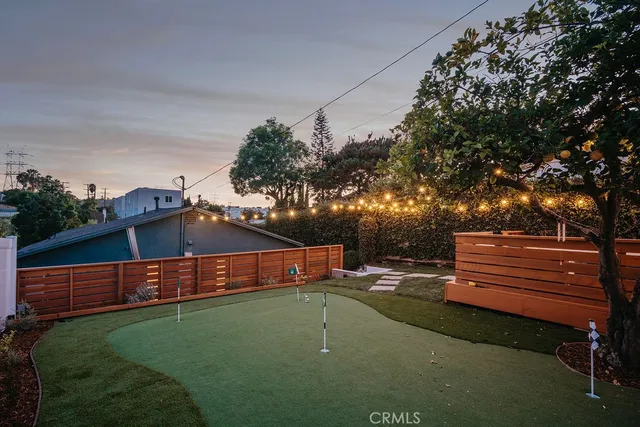 a kitchen with a stove and a sink