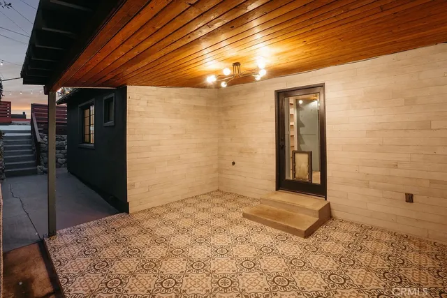 a bedroom with a bed and a walk in closet