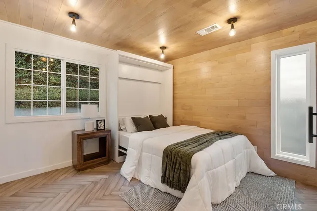 a view of a hallway with washer and dryer