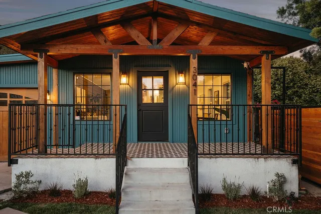 a view of backyard with a patio