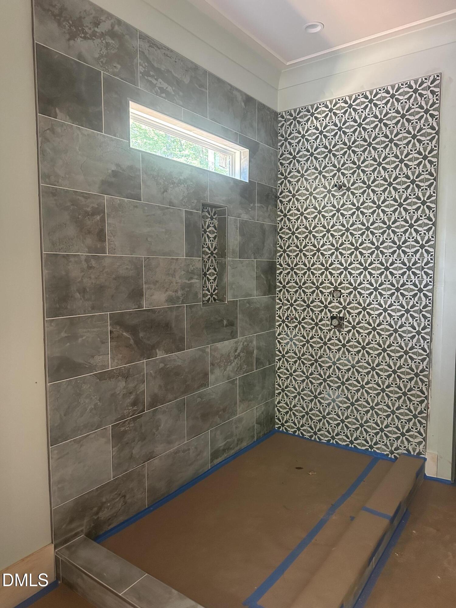 8721 Little Deer Lane Raleigh, NC 27613 - Photo 21 of 25 a bathroom with a shower