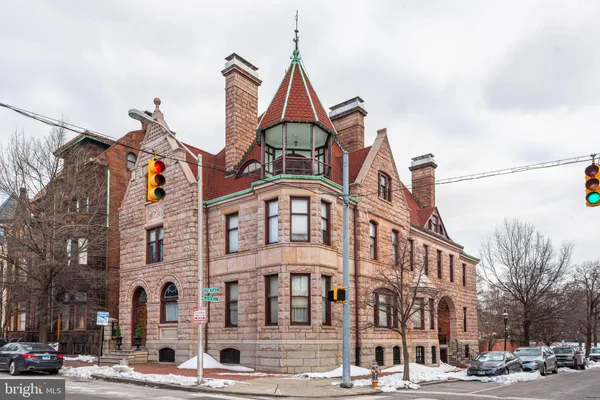 a view of a building with a street