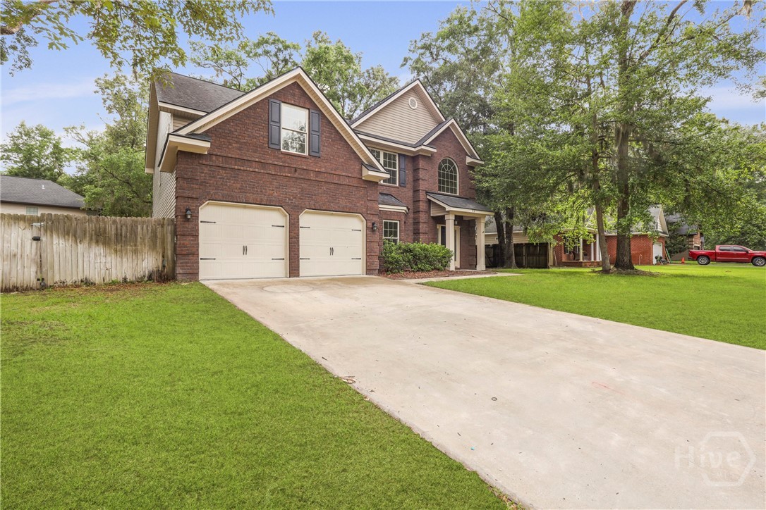 93 Veranda Trail Midway, GA 31320 - Photo 3 of 50 Grass has been digitally enhanced for the purposes