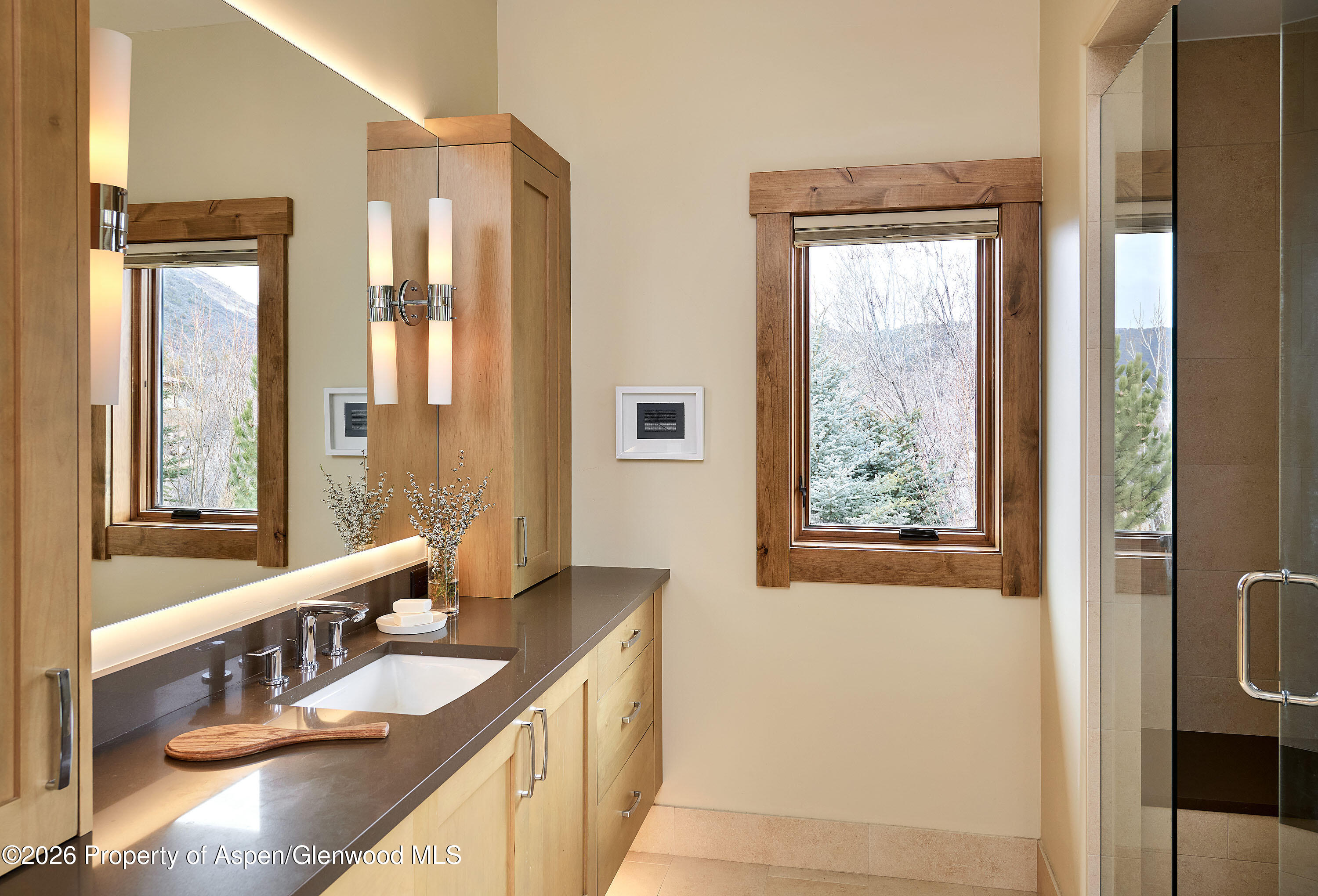 219 Overlook Ridge Basalt, CO 81621 - Photo 13 of 34 a bathroom with a double vanity sink and a mirror