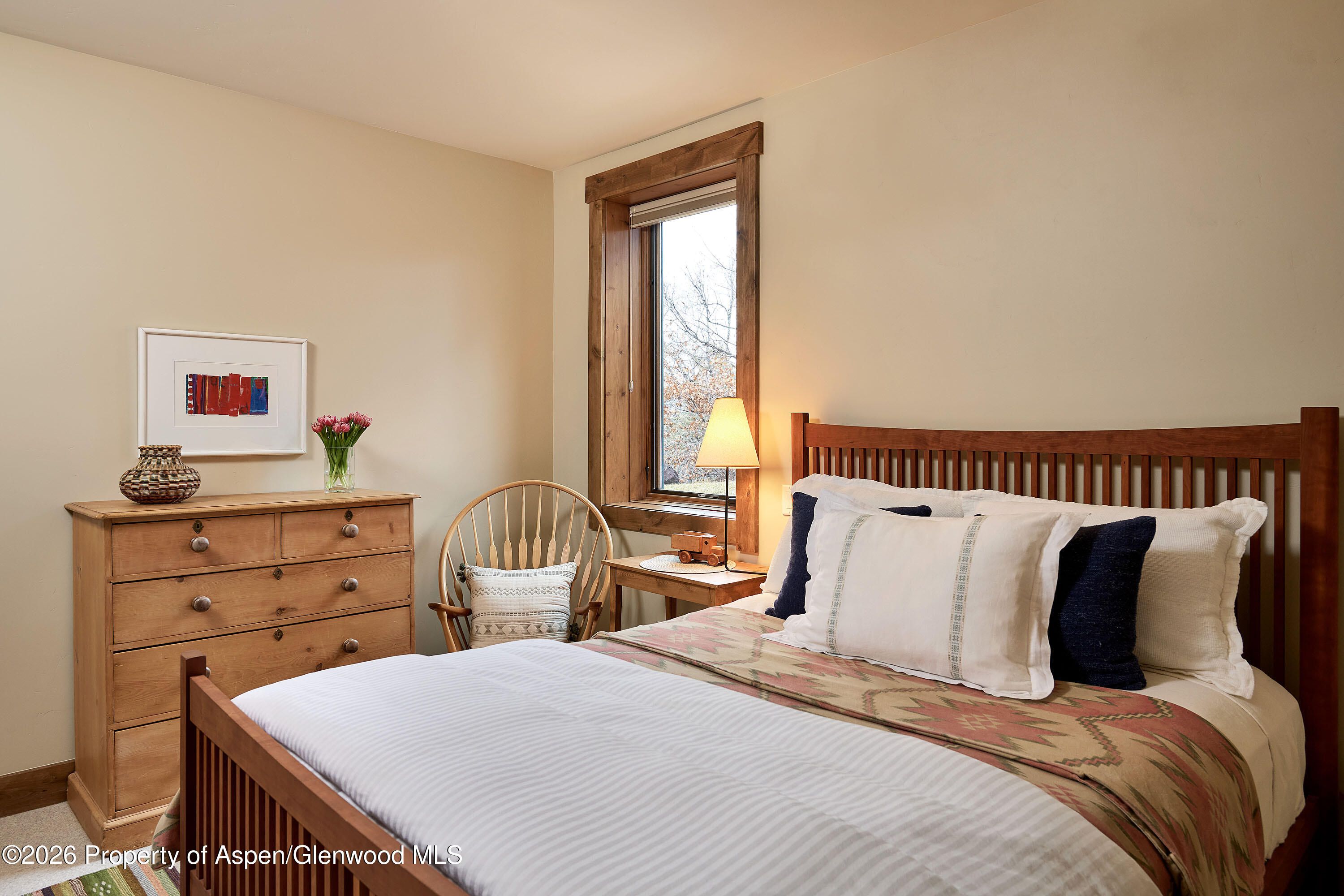 219 Overlook Ridge Basalt, CO 81621 - Photo 19 of 34 a bedroom with a bed and a dresser