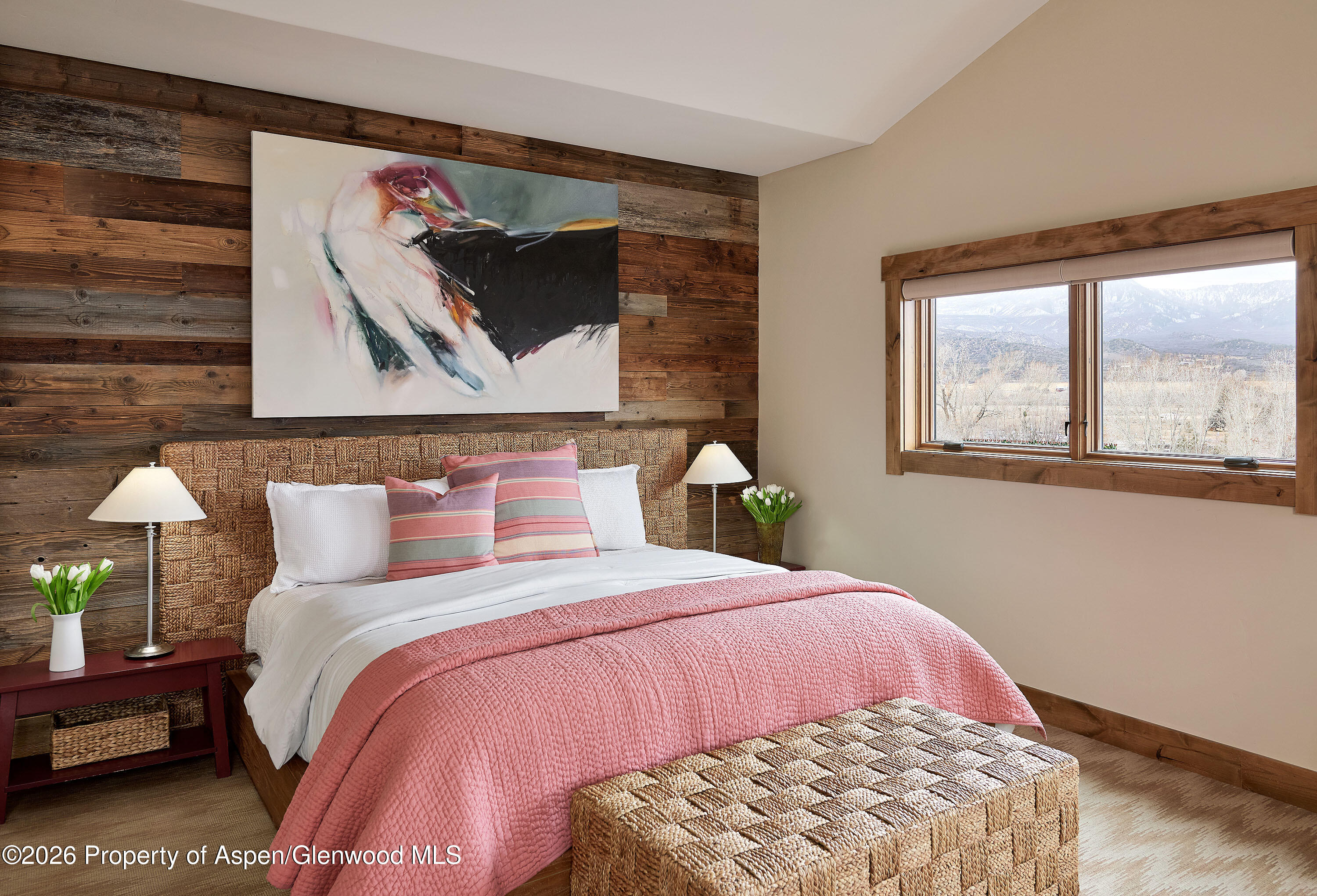 219 Overlook Ridge Basalt, CO 81621 - Photo 9 of 34 a bedroom with a bed and a painting on the wall