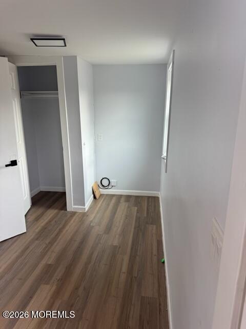 Corlies Avenue Neptune, NJ 07753 - Photo 5 of 7 an empty room with wooden floor and entrance