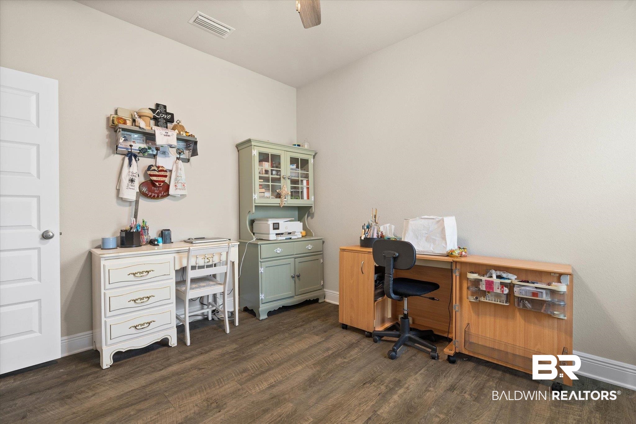 9037 Impala Drive Foley, AL 36535 - Photo 11 of 21 Office space with dark wood finished floors and a ceiling fan