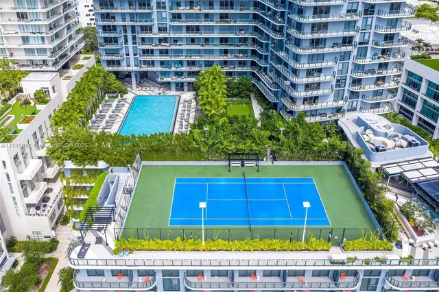 a view of swimming pool with a balcony