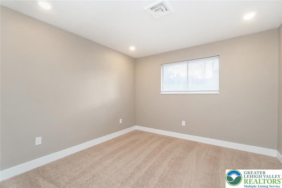 7243 Kingstead Drive Slatington, PA 18080 - Photo 18 of 36 an empty room with a window