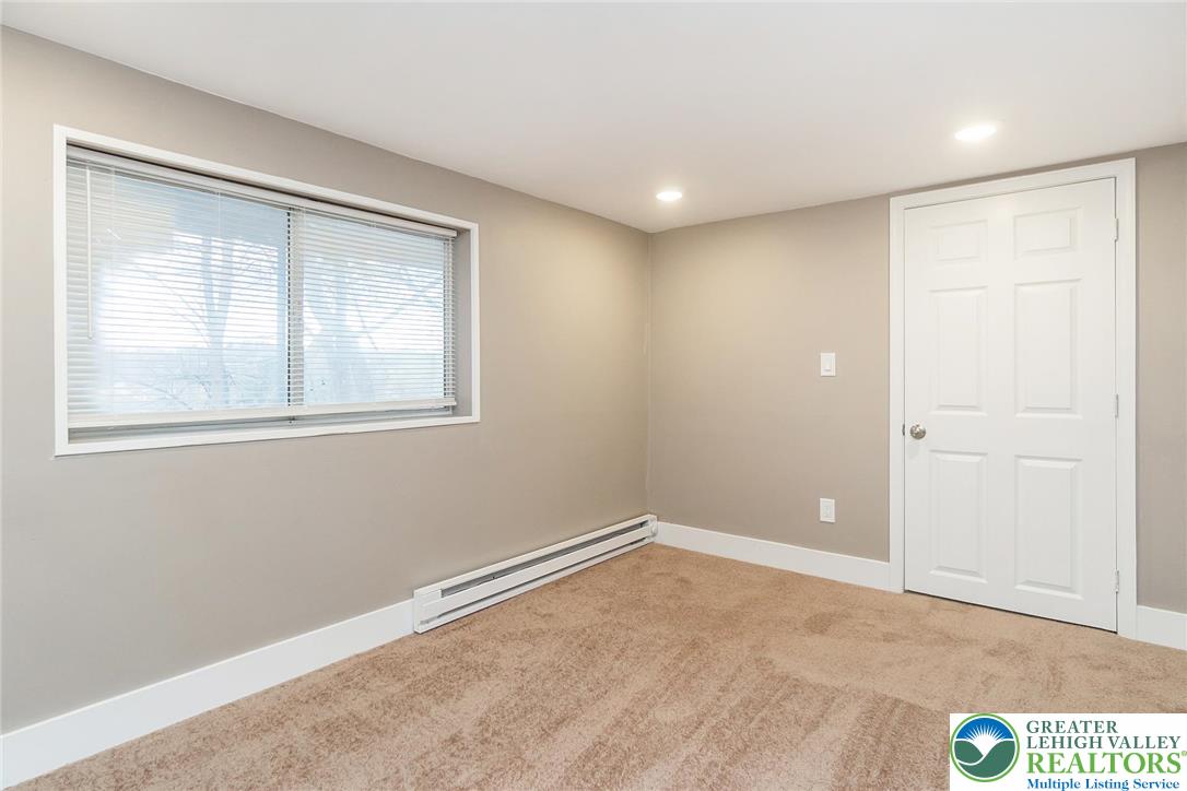 7243 Kingstead Drive Slatington, PA 18080 - Photo 31 of 36 a view of an empty room with a window