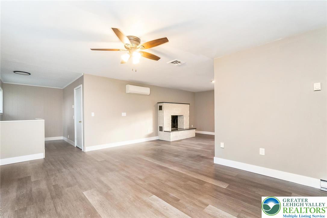 7243 Kingstead Drive Slatington, PA 18080 - Photo 10 of 36 a view of empty room with wooden floor