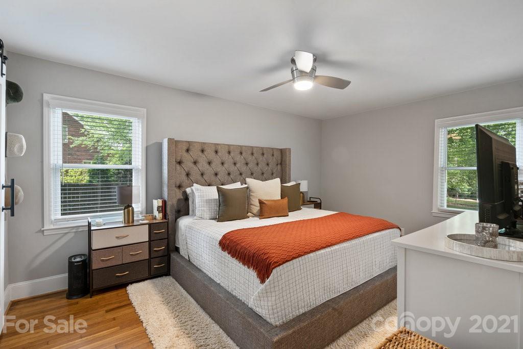 4326 Castleton Road Charlotte, NC 28211 - Photo 19 of 33 a bedroom with a large bed and a window