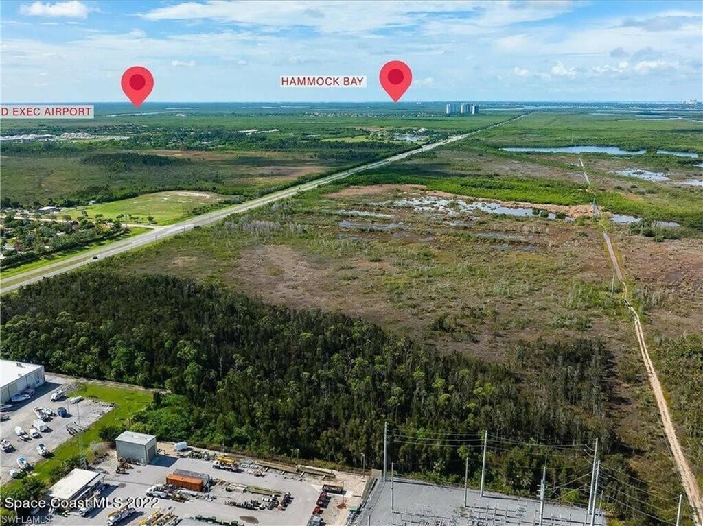 0 Collier Boulevard Naples, FL 34114 - Photo 5 of 8 a view of a wooden floor and pool