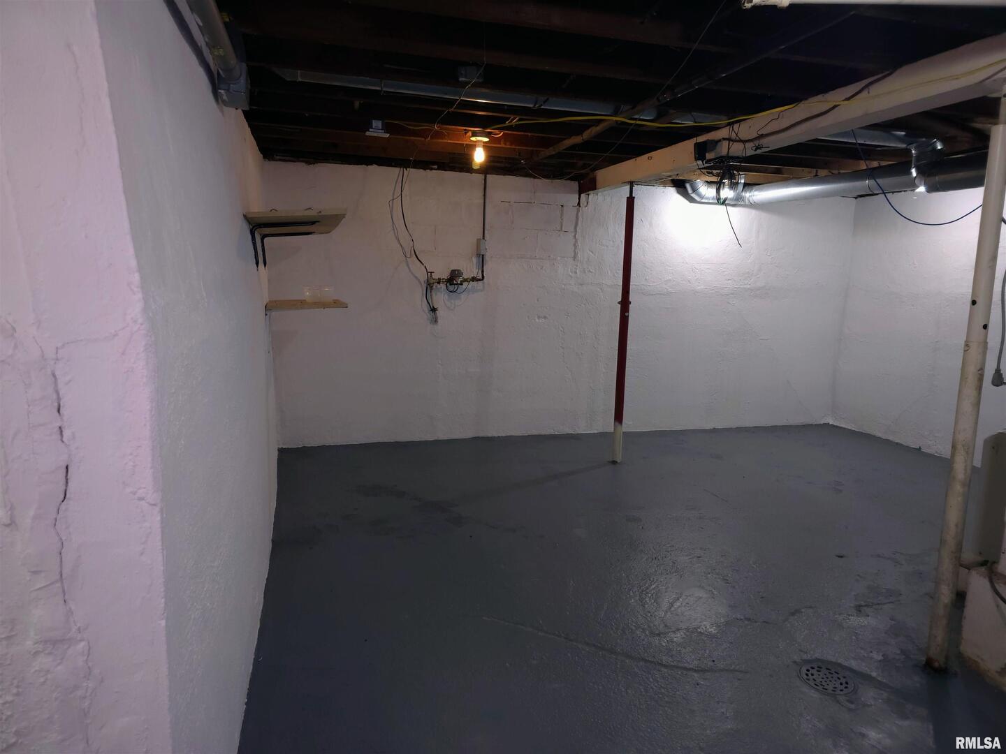 603 Adams Street Muscatine, IA 52761 - Photo 14 of 17 a view of a room with racks on the wall