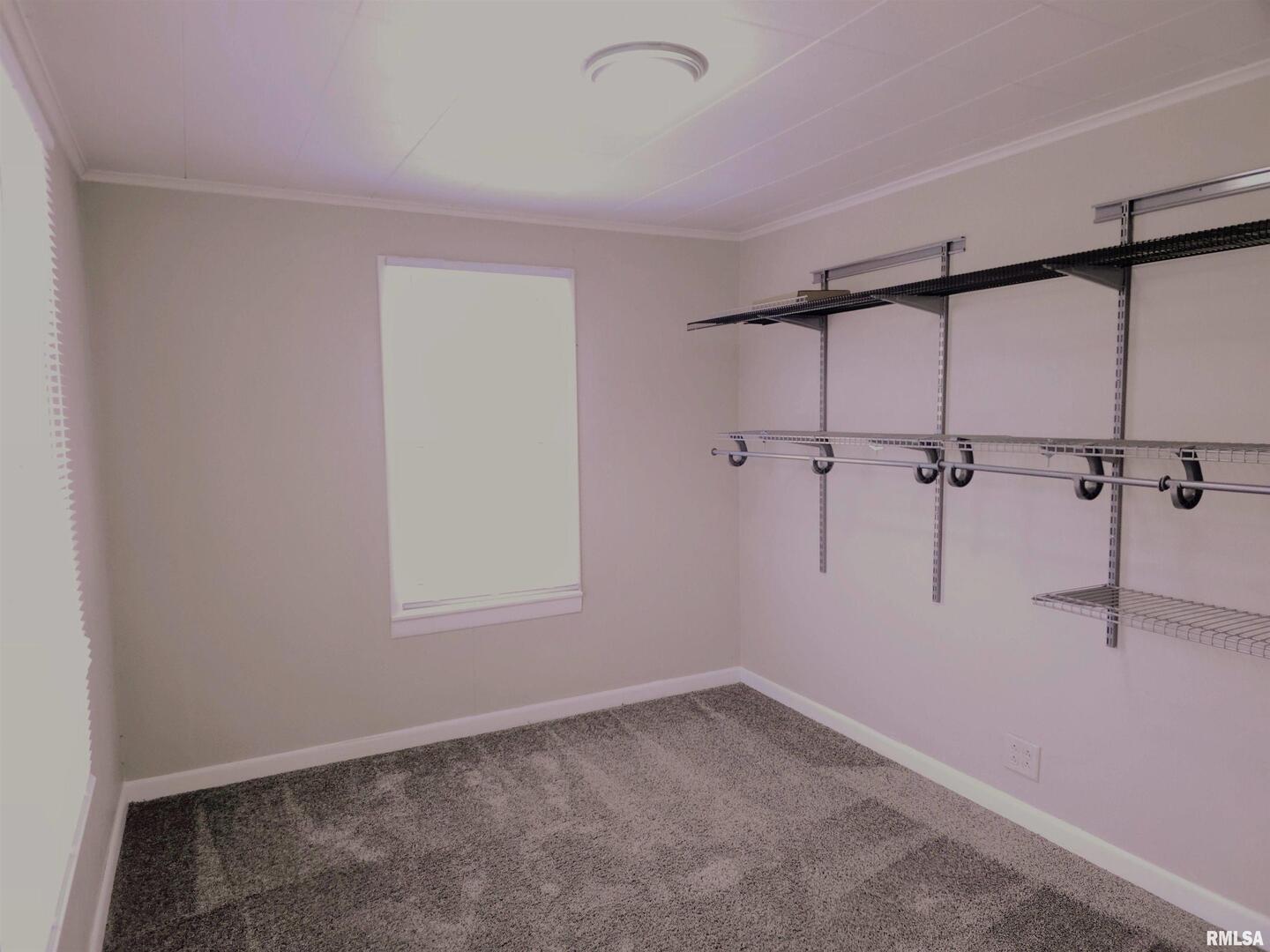 603 Adams Street Muscatine, IA 52761 - Photo 10 of 17 a view of a room with a window