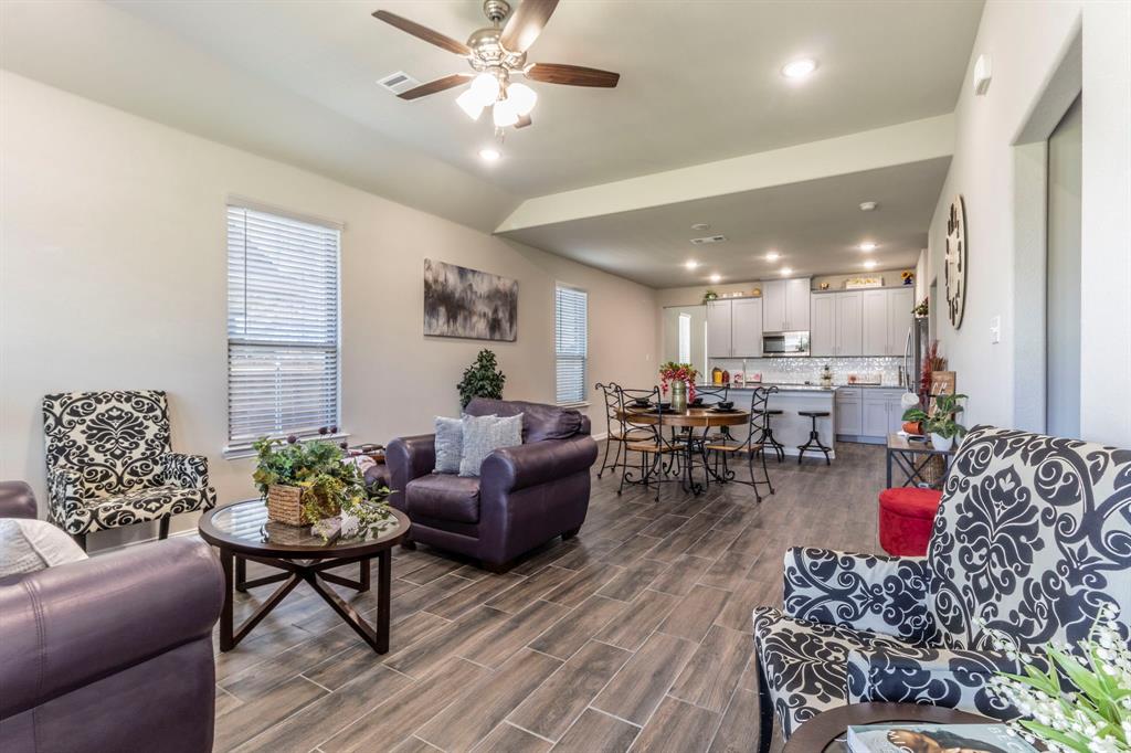 626 Ruthye Lane Pilot Point, TX 76258 - Photo 15 of 27 Living room with a ceiling fan, recessed lighting, and wood-look tile floors