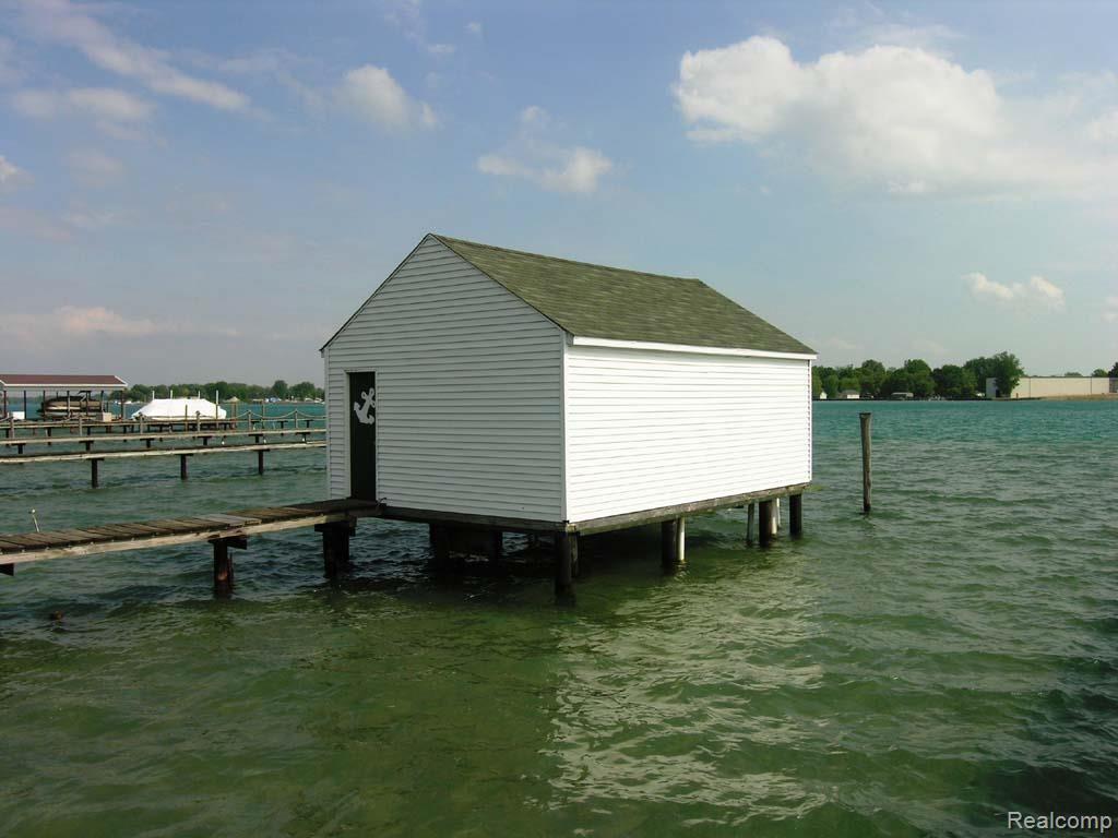4587 Pointe Tremble Road Algonac, MI 48001 - Photo 12 of 30 12 back of boathouse.jpg