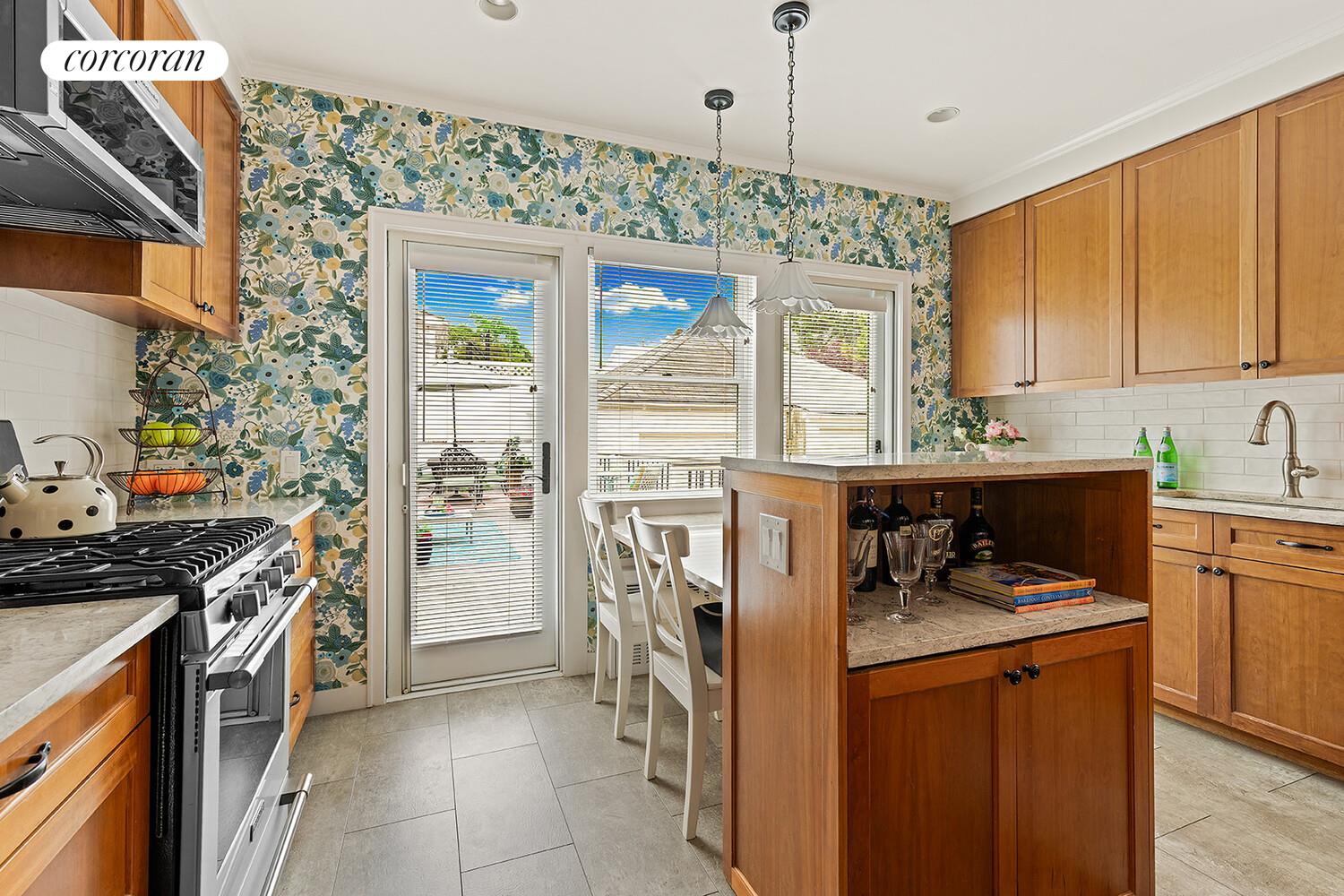 7709 Colonial Road Brooklyn, NY 11209 - Photo 5 of 13 a kitchen with a sink stove and refrigerator