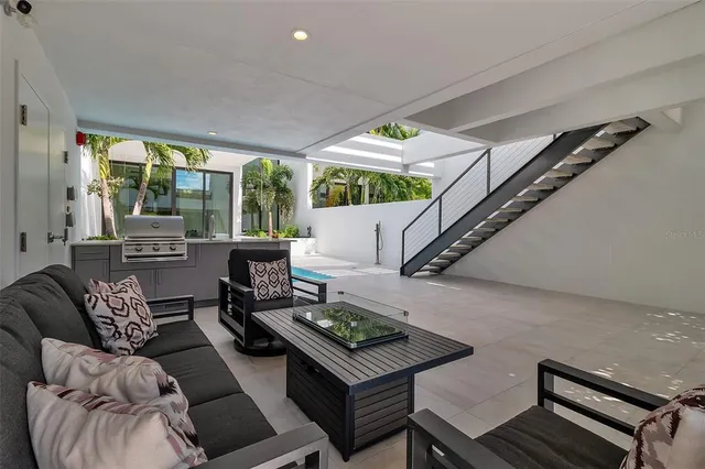 a view of a balcony with chairs