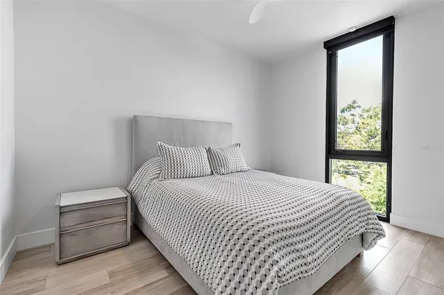 a kitchen with stainless steel appliances a microwave and a sink