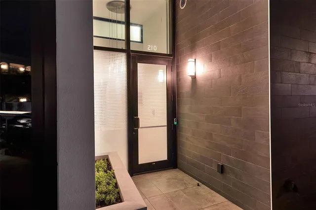 a bathroom with a shower and a sink