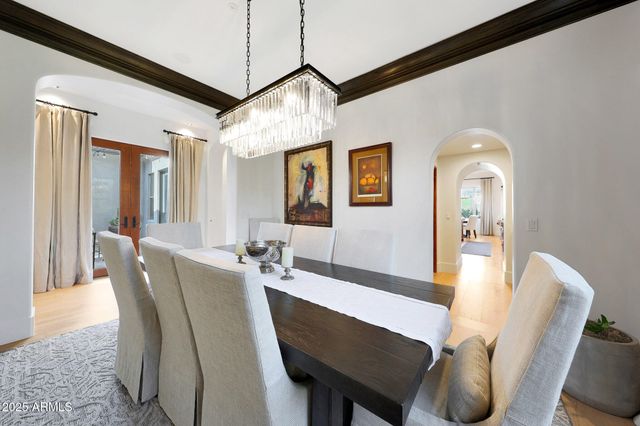 a living room with furniture a window and a fireplace