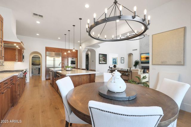 a kitchen with a stove and a microwave