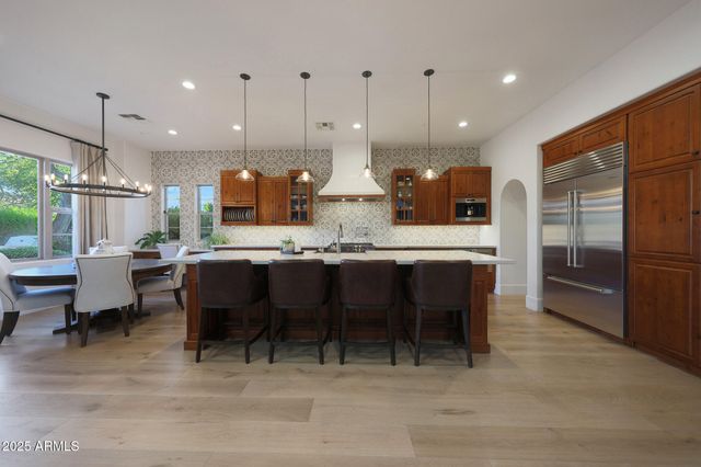 a living room with furniture potted plant and a window