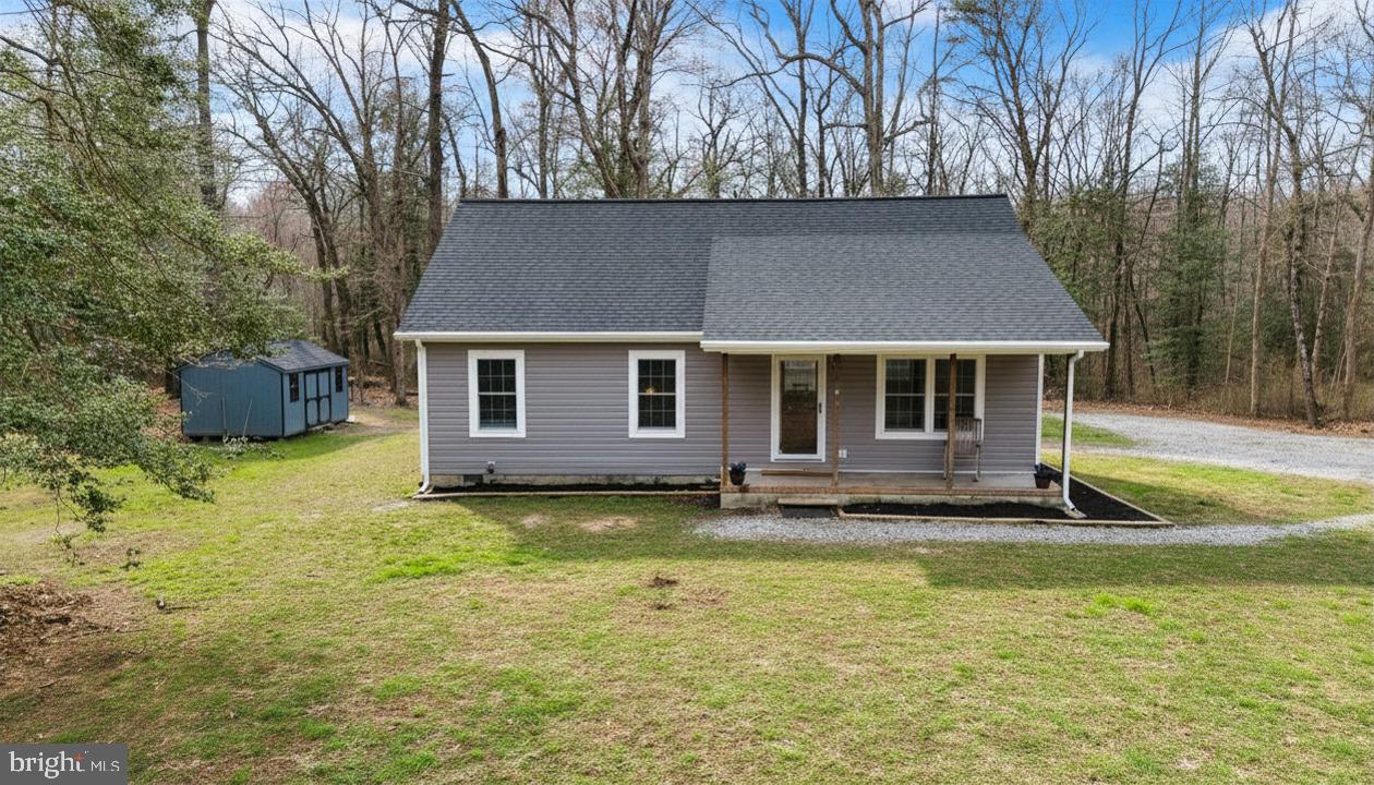 25095 Trunk Line Road Henderson, MD 21640 - Photo 2 of 9 Charming home nestled in nature's embrace.