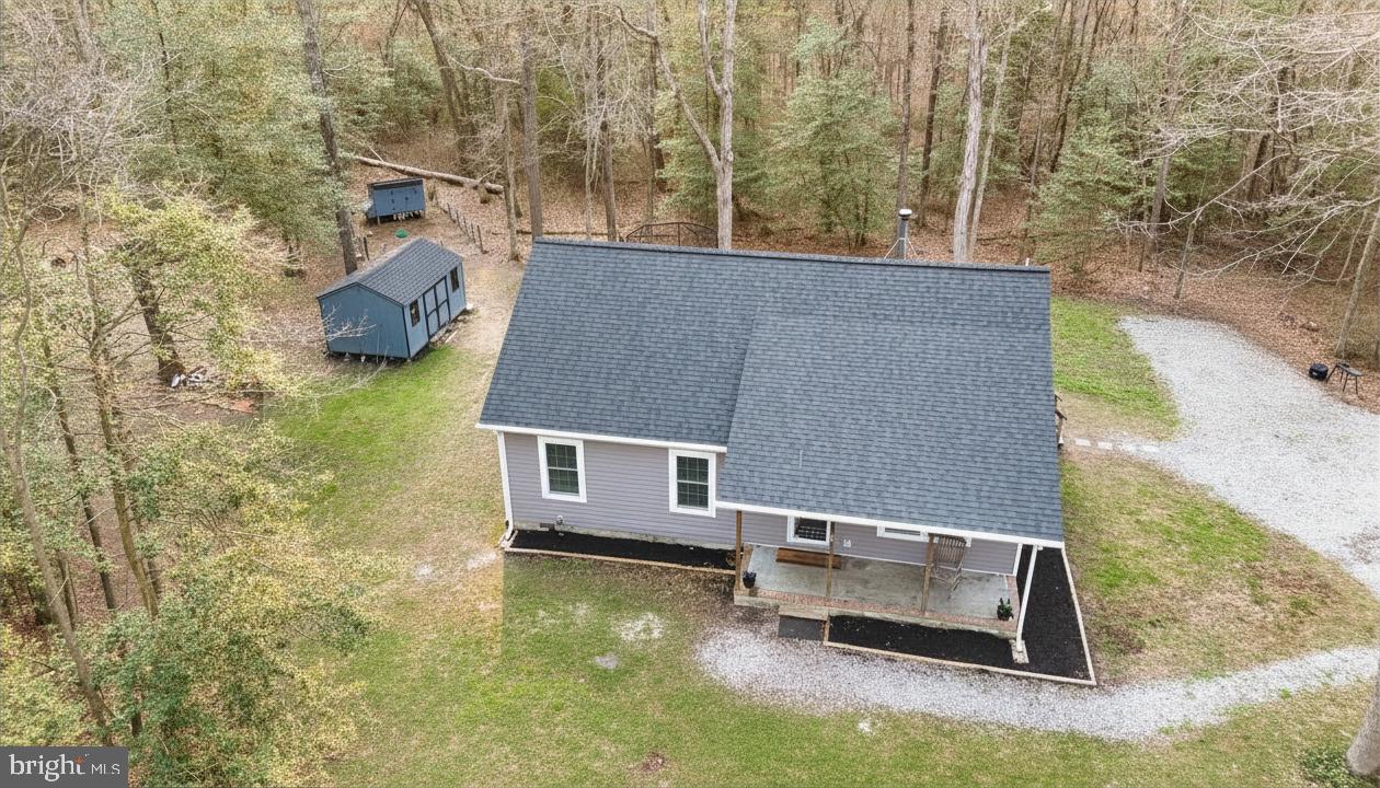 25095 Trunk Line Road Henderson, MD 21640 - Photo 3 of 9 Charming home nestled in serene woods.