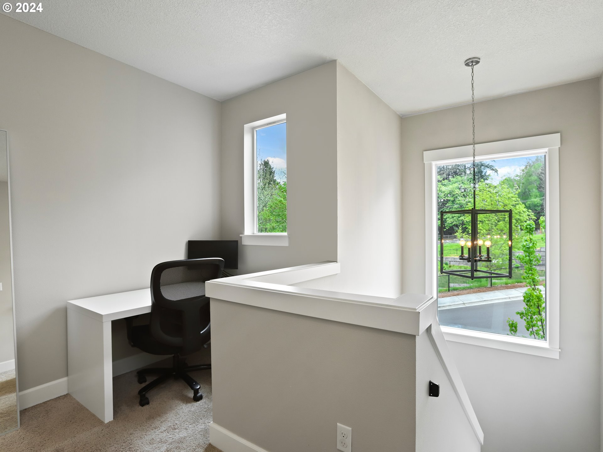 8087 Southwest Oldham Drive Beaverton, OR 97007 - Photo 21 of 46 a room with a window table and chairs
