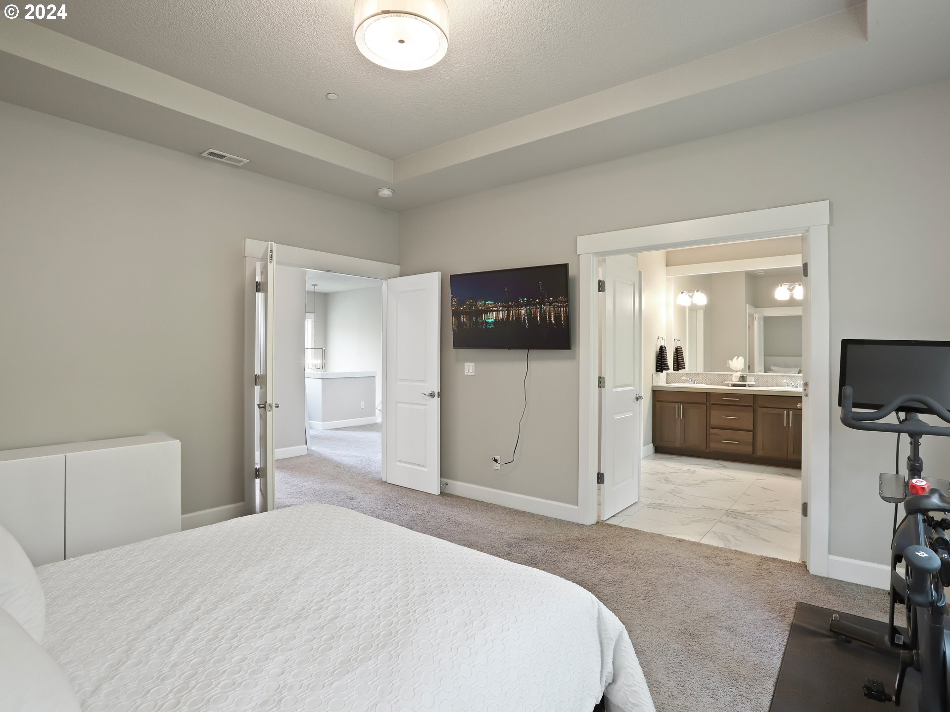 8087 Southwest Oldham Drive Beaverton, OR 97007 - Photo 25 of 46 a bedroom with a bed and a television