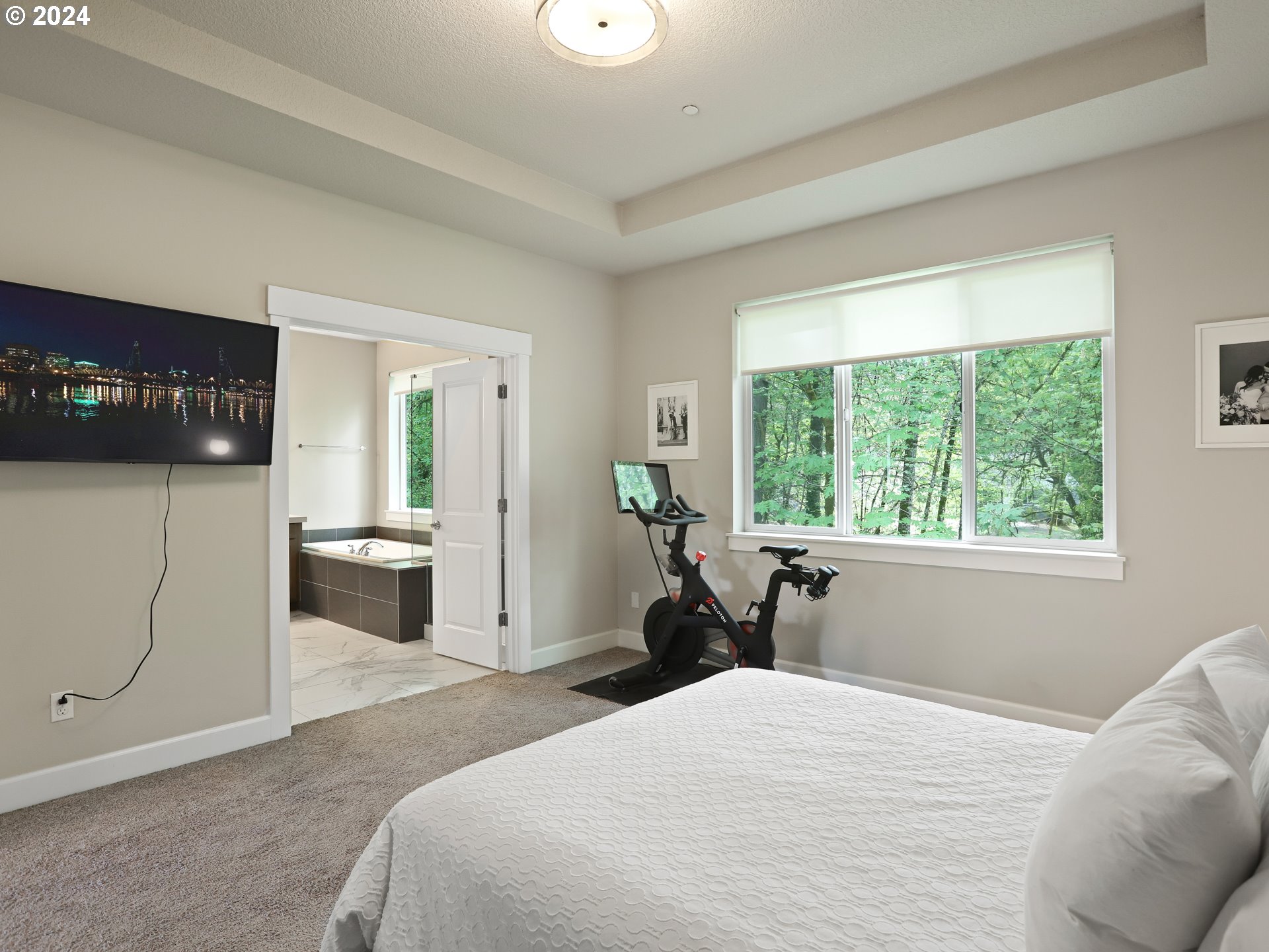 8087 Southwest Oldham Drive Beaverton, OR 97007 - Photo 26 of 46 a bed room with a bed and a large window