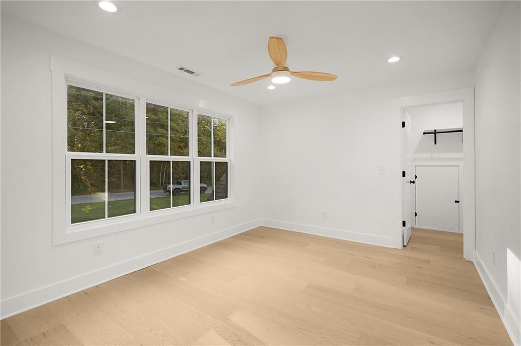140 Cambridge Court Calhoun, GA 30701 - Photo 23 of 29 an empty room with windows