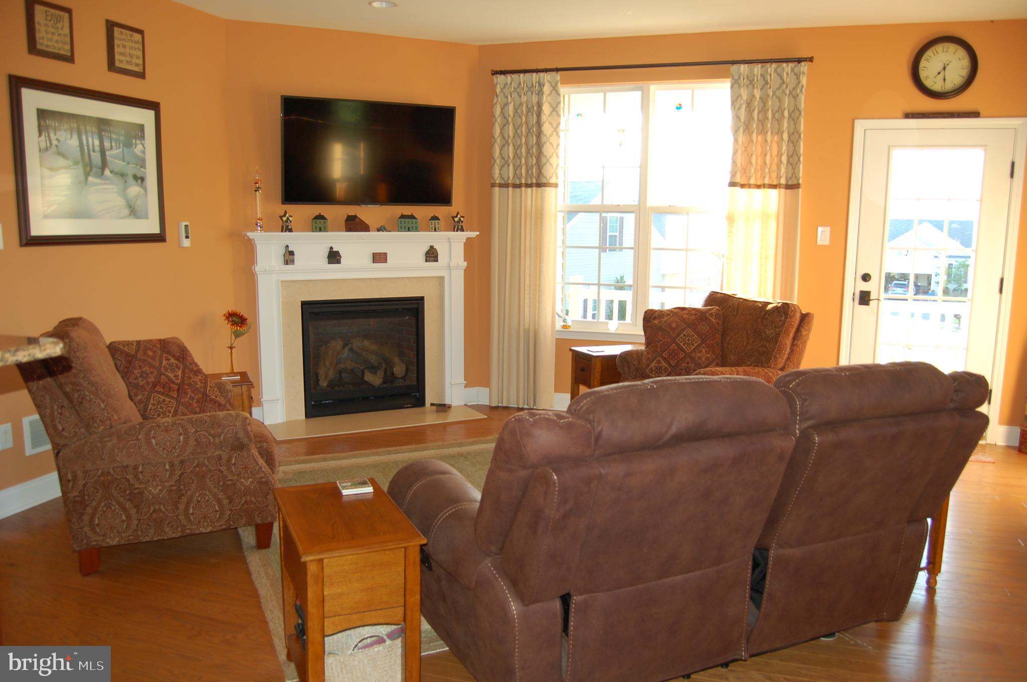 208 Davish Road Coatesville, PA 19320 - Photo 8 of 28 Living room with corner gas fireplace