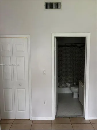 a bathroom with a toilet