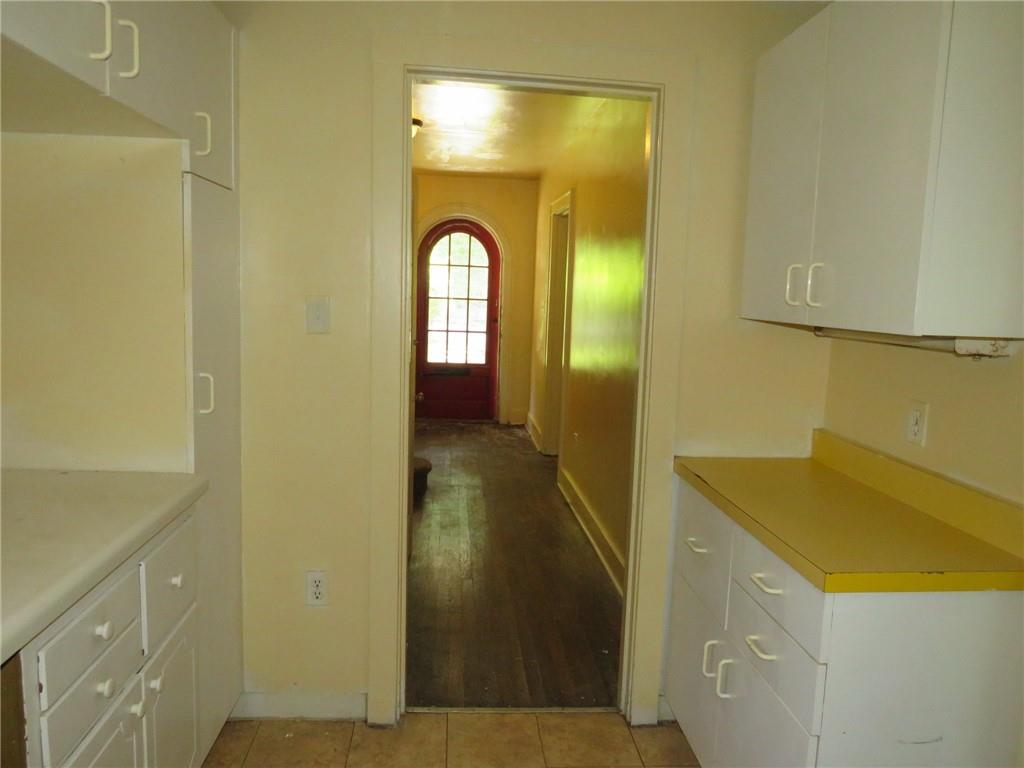 423 Braddock Road Pittsburgh, PA 15221 - Photo 12 of 36 a bathroom with a sink and a mirror