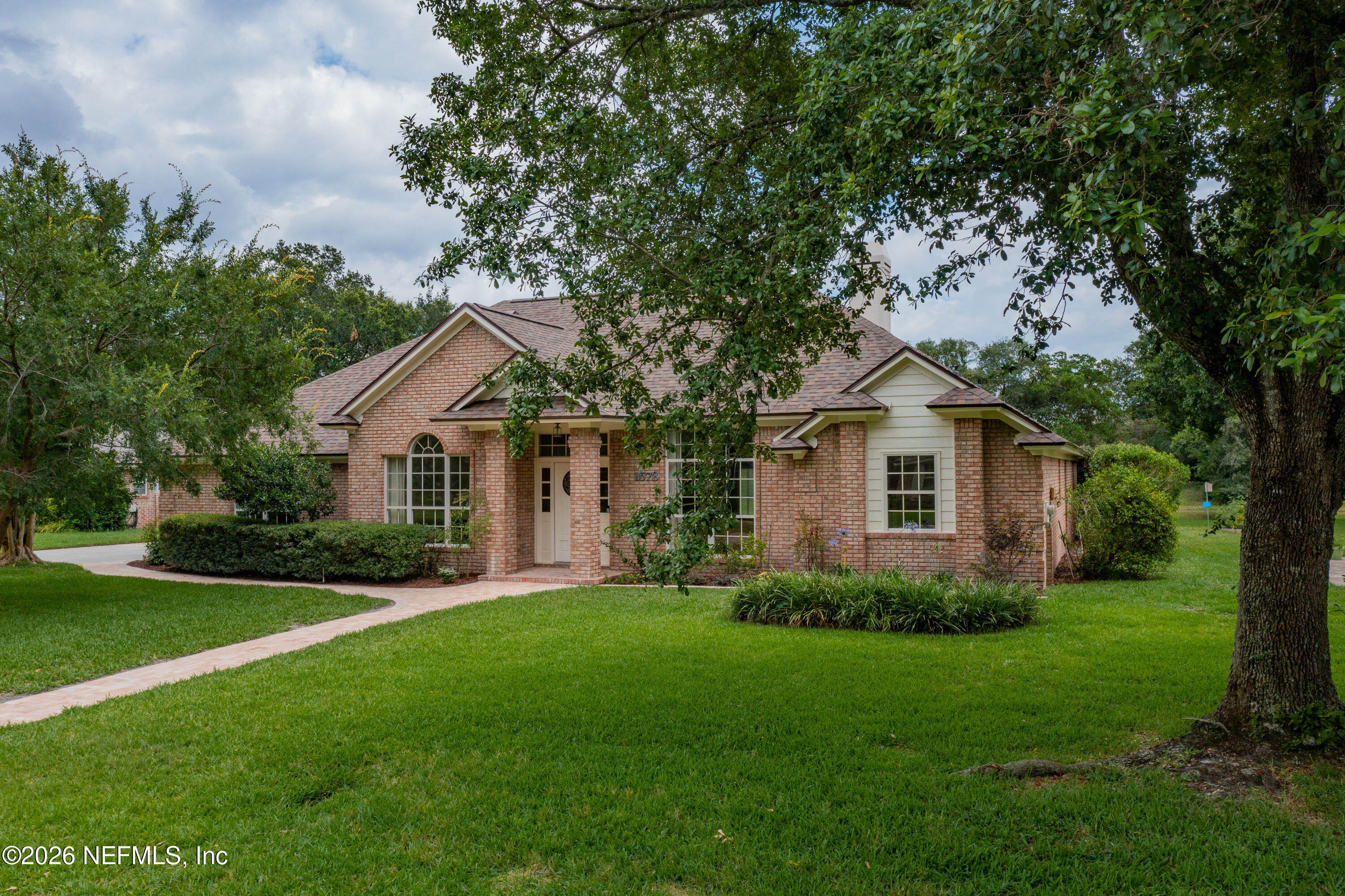 1573 Chain Fern Way Fleming Island, FL 32003 - Photo 42 of 57 42House Front_resized
