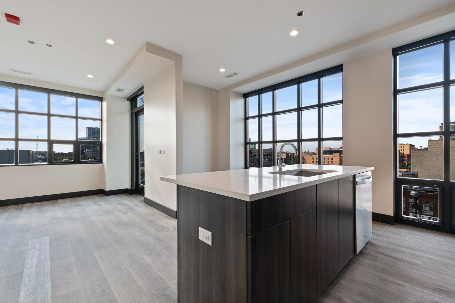 Undisclosed Address Chicago, IL 60607 - Photo 3 of 8 a kitchen with stainless steel appliances granite countertop a sink and a stove