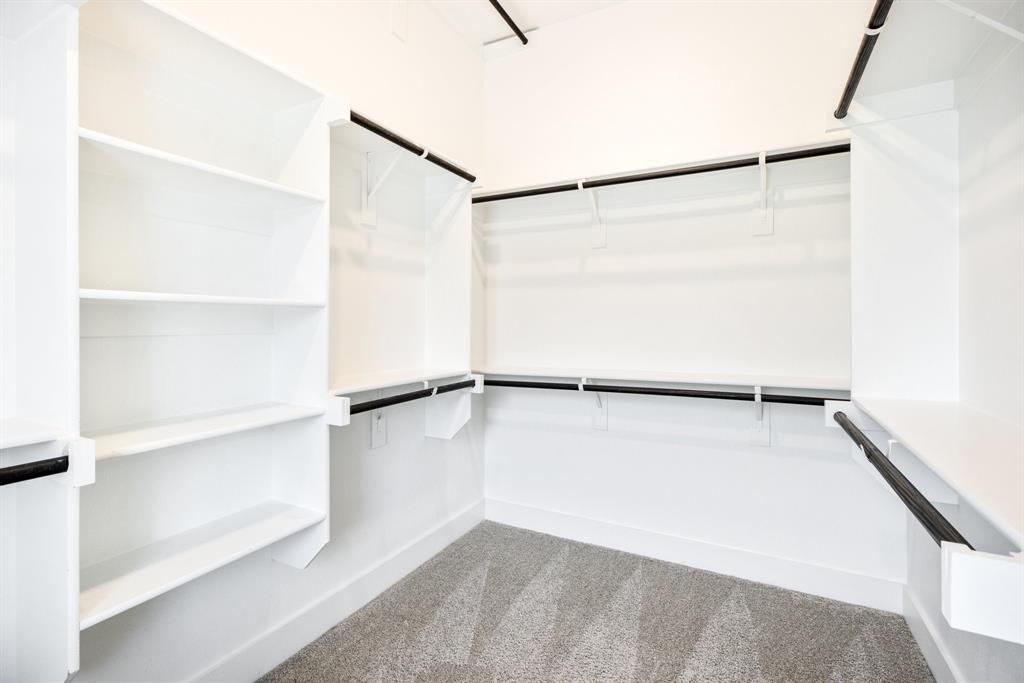 4502 Smokey Quartz Lane Arlington, TX 76005 - Photo 21 of 32 a view of an empty walk in closet