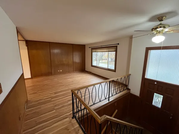 a view of an entryway wooden floor