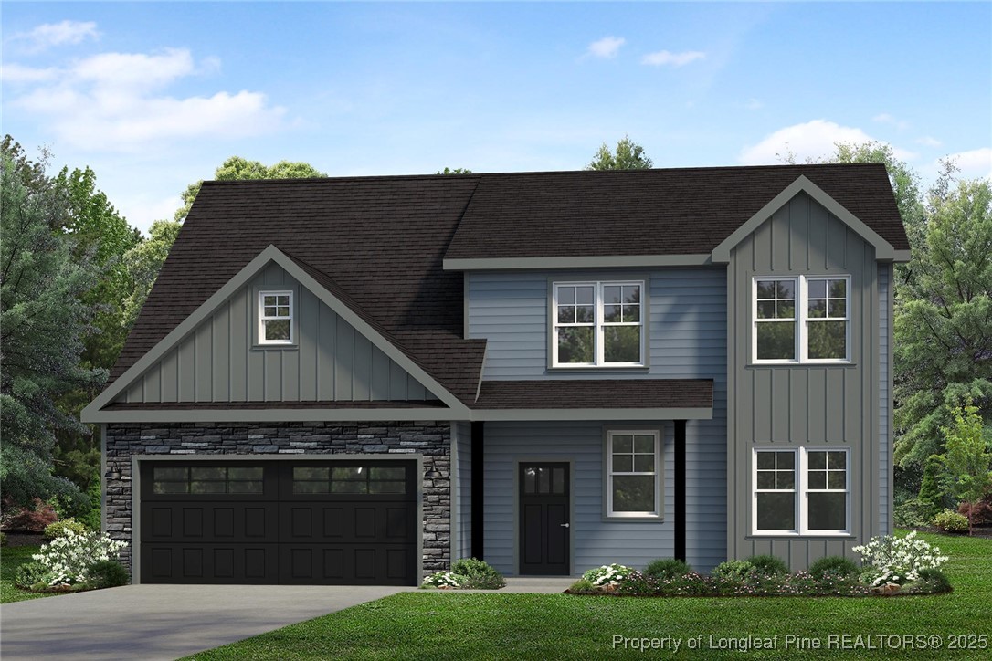 58 Magnolia Grv Way Cameron, NC 28326 - Photo 1 of 25 a front view of a house with a garden