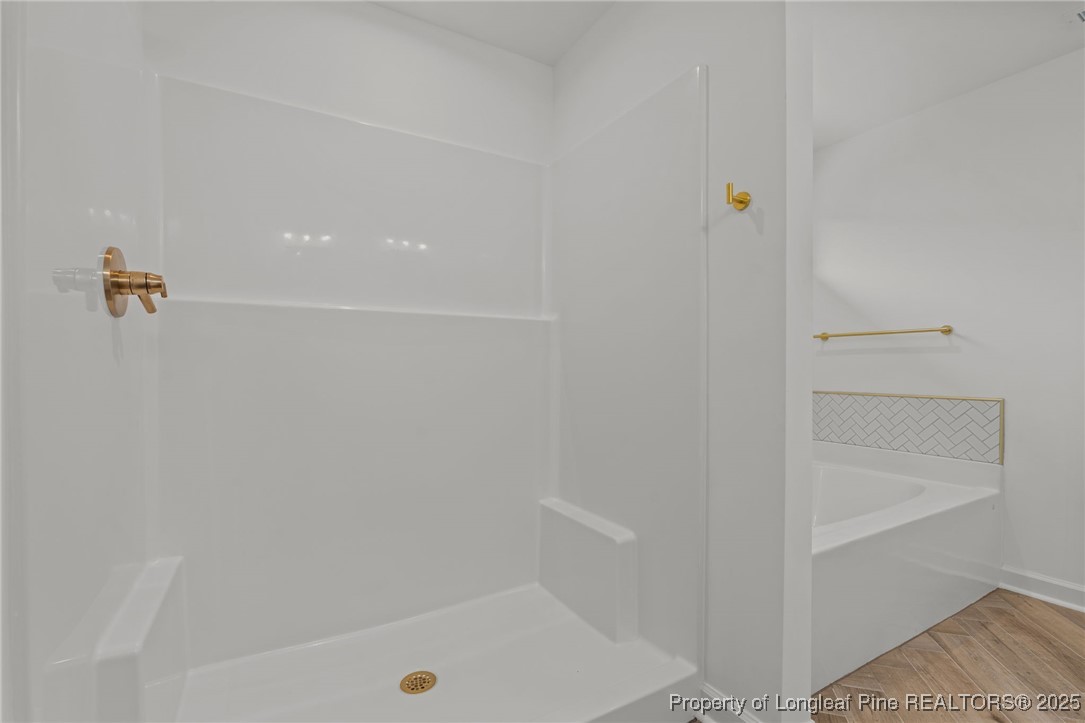 58 Magnolia Grv Way Cameron, NC 28326 - Photo 23 of 25 a bathroom with a bathtub