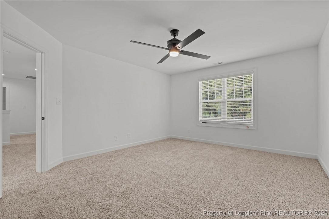 58 Magnolia Grv Way Cameron, NC 28326 - Photo 25 of 25 an empty room with windows
