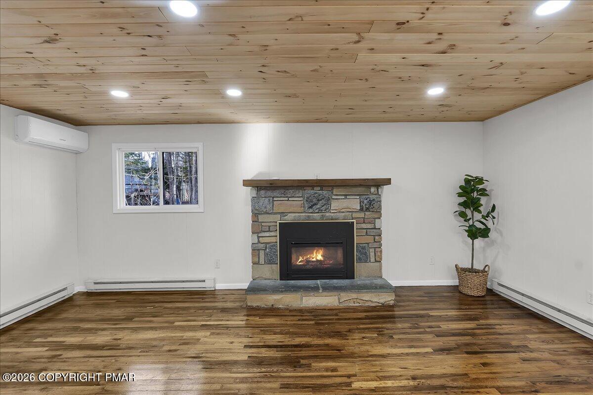 309 Selig Road Pocono Lake, PA 18347 - Photo 12 of 25 a view of a livingroom with a fireplace